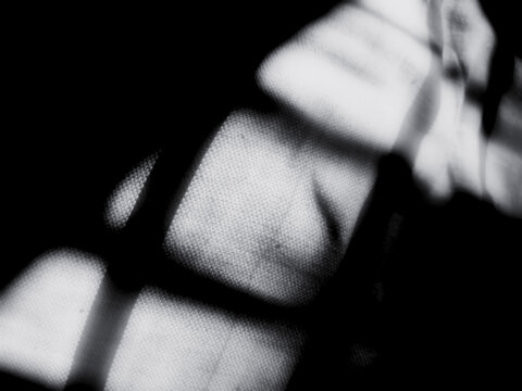 Retro film grain texture overlay for vintage photo effects on dark