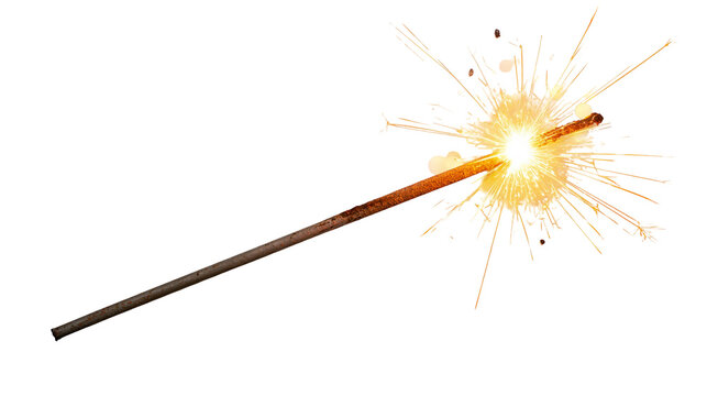Bright burning sparkler firework emitting golden sparks and glowing light