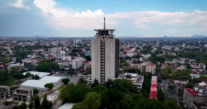 Drone view of the historic Centro SCOP telecommunications building in Mexico City, a landmark of twentieth-century Mexican modernist architecture in the Narvarte district.