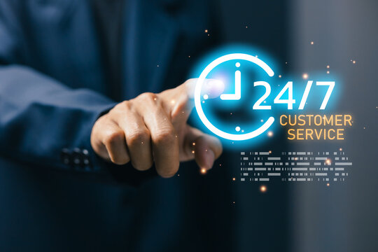 Business professional touches a virtual 247 customer service clock interface, representing round-the-clock support, help desk assistance, client care, contact center, and online service.