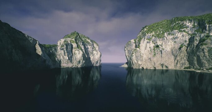 Majestic rocks border calm water, Secluded passage amid towering stone formations, Narrow strait with lofty rocks on either side and serene blue ocean