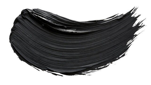 Thick black cosmetic makeup cream smear with visible brush bristle texture