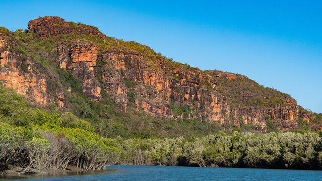 australia kimberley dramatic landscape sandstone red orange cliffs iconic scenery water ocean coastal
