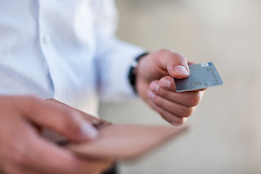 Close-up of businessman holding credit card