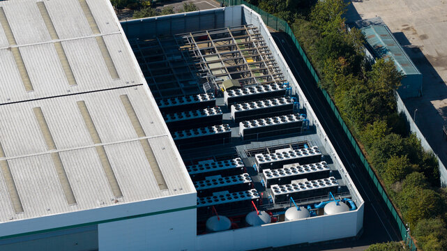 Aerial view shows a modern datacenter cooling infrastructure outdoors