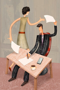 Businessman and secretary work together on paperwork at the office