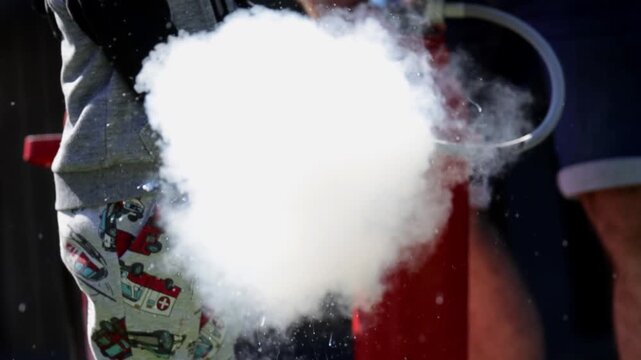 Outdoor Carbon Dioxide Fire Extinguisher Use Close Up Slow Motion