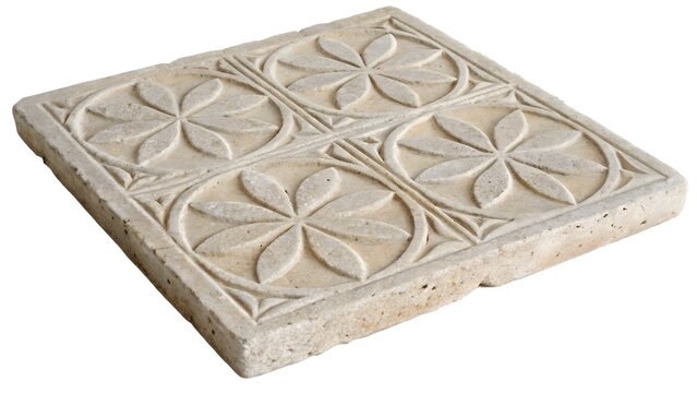 Square stone tile featuring intricate carved floral patterns divided into four symmetrical quadrants displayed on a plain white studio background.