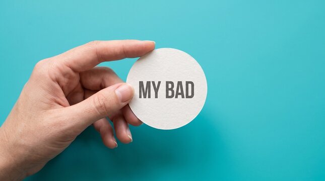 My Bad Apology Concept with Hand Holding Badge