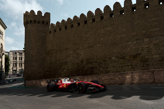 BAKU, AZERBAIJAN - SEPTEMBER 2026: Charles Leclerc drives the Ferrari F1 car past the historic fortress walls of the Old City during the Formula 1 Azerbaijan Grand Prix 2026