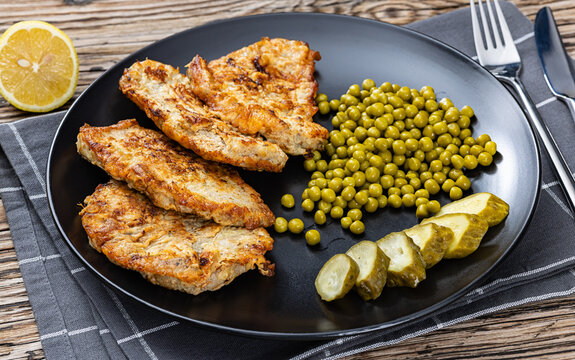batter fried pork cutlets on a plate