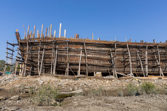Large wooden ship hull under construction, Mandvi, India