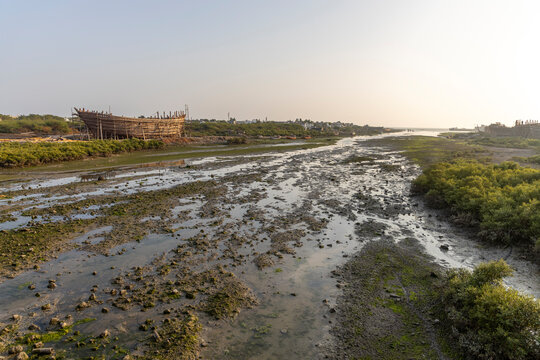 Tidal creek leading to a shipyard, Mandvi, India