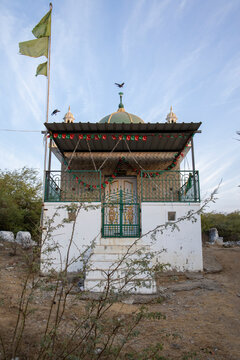 Small ornate shrine decorated with bunting, Mandvi, India