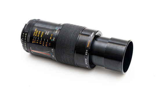 Iserlohn, Germany - September 20, 2026: Kiron 105mm f/2.8 macro camera lens with extended lens hood on a white background