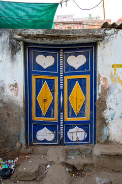 Traditional blue door with heart motifs, Mandvi, India