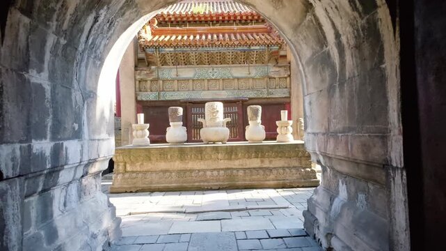 View through open gate toward carved stone pillars at Zhaoling Tomb
