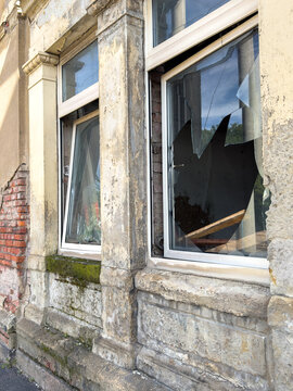 Broken Windowpane After Break In at an Old House