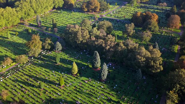 Aerial Video of Manchester Southern Cemetery Sections and Tree Lined Paths at Sunrise. 