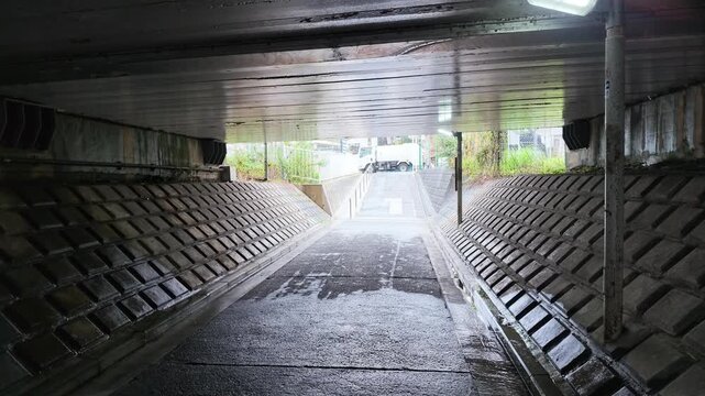 Rainy pedestrian underpass in suburban Japan