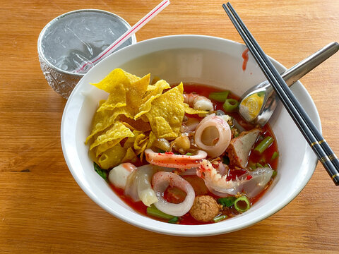  Thai Yen Ta Fo pink noodle soup with seafood, top view