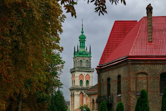dramatic autumn medieval city landmark buildings framed by October foliage