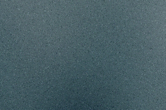 Abstract petrol-toned storm gradient with blurred atmospheric depth, muted color blending, and coarse granular noise across a softly textured background