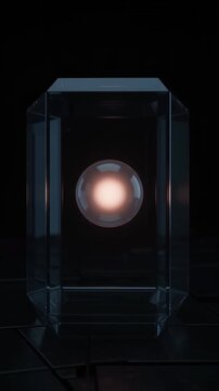 Glowing orb inside a glass cube on a dark futuristic background