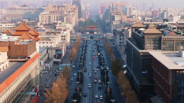 Elevated View of Xi'an City Avenue with Autumn Trees and Traditional Gate Tower in Xi an, China