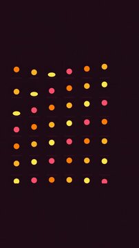 Vertical 9:16 animated bouncing balls grid phasing diagonally in amber and orange on a dark background. Seamless looping 4K motion graphics in portrait format for reels, shorts, stories and music vide