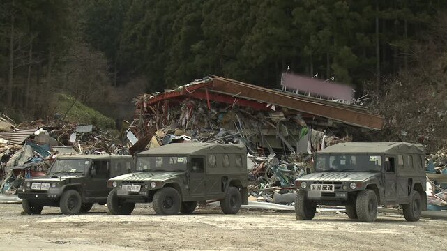 Military Vehicles In Disaster Zone In Aftermath Of Tsunami In Japan