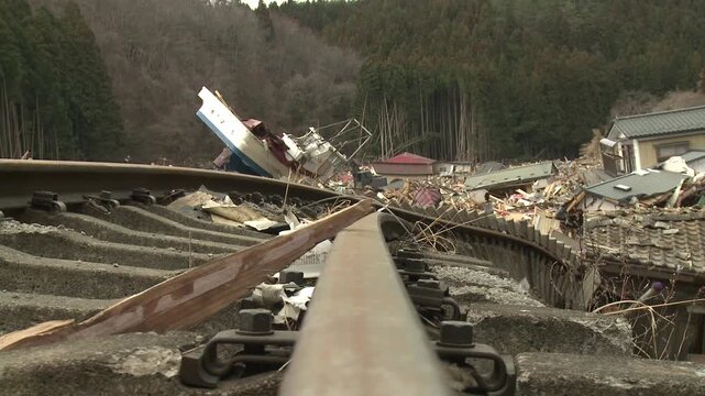 Damaged And Debris Strewn Railway Track In Aftermath Of Tsunami In Japan