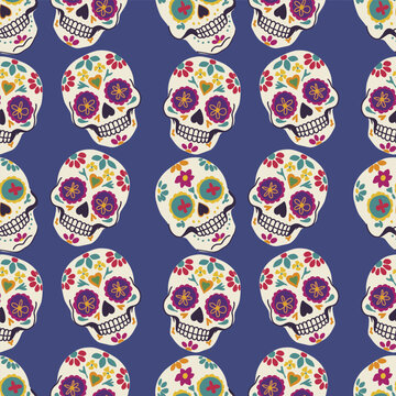 Colorful Mexican Day of the Dead vector seamless pattern with sugar skulls and marigold.