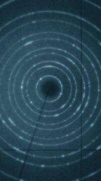 X-ray powder diffraction Debye rings rotating crystal grain texture dark detector seamless loop in rich blue tones vertical 9:16