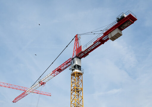 Crane tower at construction site, urban city development, engineering industry, machinery, equipment and heavy duty