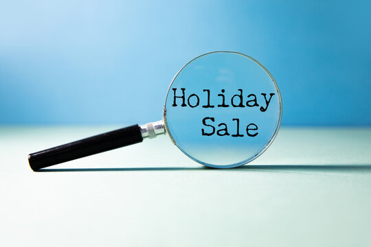 Holiday Sale text on paper