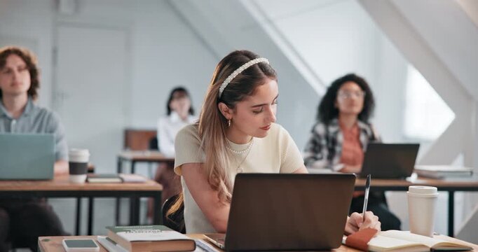 Woman, student and writing in class with notebook, college lecture and exam revision for education. Smile, female person and laptop at campus with study planner, academic lesson and learning summary