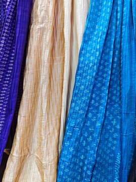 Assortment of traditional woven silk cotton fabric cloths with exotic pattern on display sale, Hand Stitched Textile Industry, Asian Fashion Craft, Thai Exquisite Clothing, Elegant Embroidery