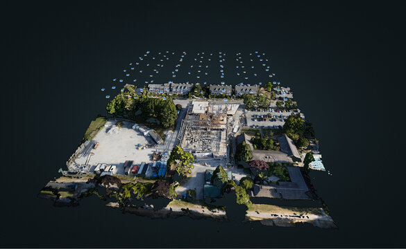 Aerial view of a 3D photogrammetry model showing a construction site with camera positions, buildings, trees, and a parking lot in Richmond, British Columbia, Canada.