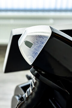 A photo of a high-performance laser hair removal device, captured with ice on it. It performs a highly effective procedure and is a model from the latest generation.