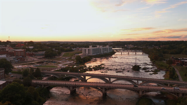 Aerial view of the Dan River flowing under historic bridges in Danville, Virginia, United States.