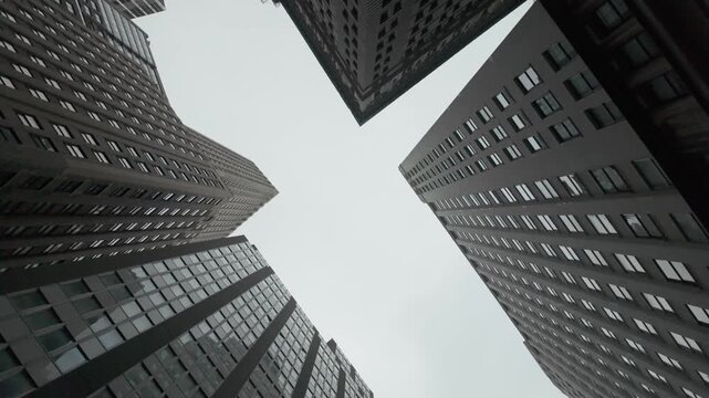 Financial district skyscrapers rising towards the sky in downtown manhattan, new york city, representing the stock market, global economy, and corporate business