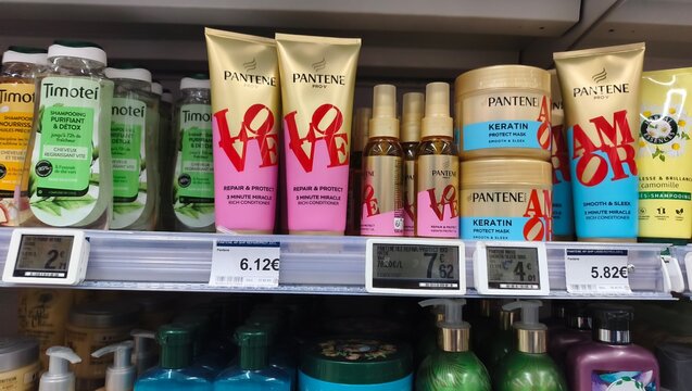 Royan, France - July 25, 2026: E.Leclerc ROYAN CEDEX. Pantene hair care products displayed on a supermarket shelf, featuring various shampoos and conditioners in colorful packaging