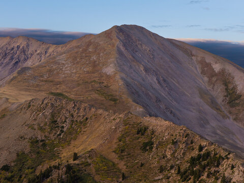 Aerial view of Missouri Mountain and the surrounding rugged Sawatch Range terrain, featuring rocky slopes, alpine vegetation, and the Missouri Gulch Trail in Buena Vista, Colorado, United States.