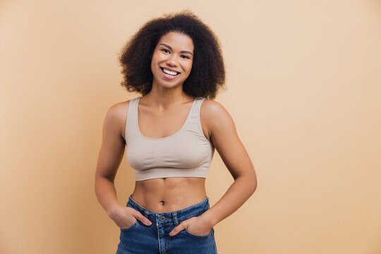 Young African American woman smiling looking at camera