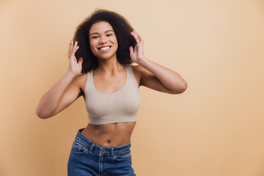 African American woman smiling, showing natural beauty