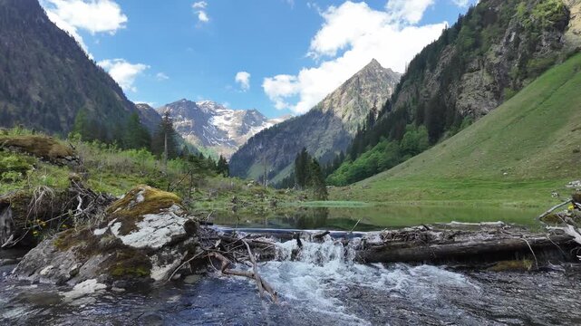 Waterfall river nature. Landscape with waterfall river cascade. Scenic nature river flow. Picturesque waterfall creek. Nature wildness. River flow cascade. Wild creek flow