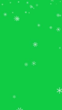 snow flakes falling green screen animation,snowfall new year and Christmas chroma key isolated vertical social media motion design element