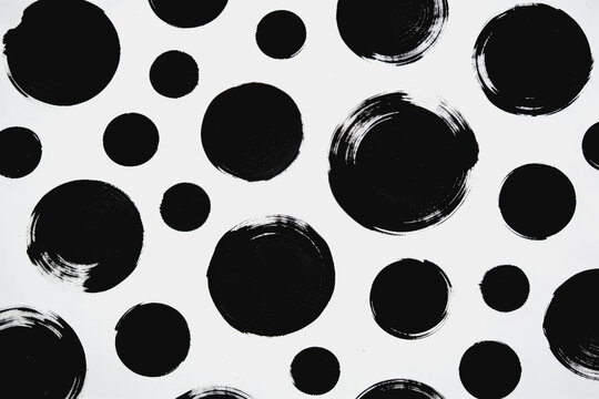 Black Brushstroke Circles on White Background