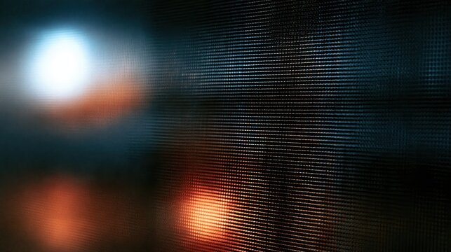 Dark pixelated mesh screen background with blurred light bokeh for tech interface wallpaper and display design
